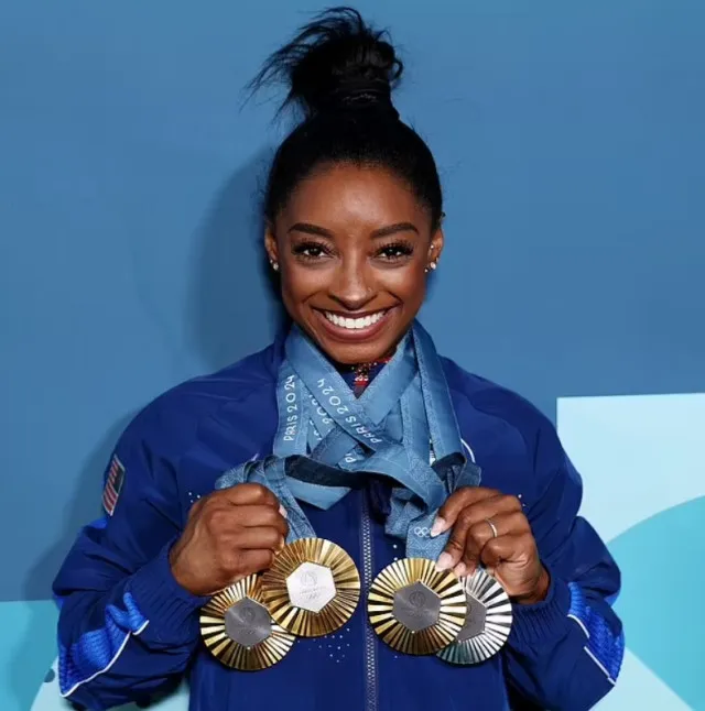 simone biles birth mother reveals reason for abandoning her after she begs 2643