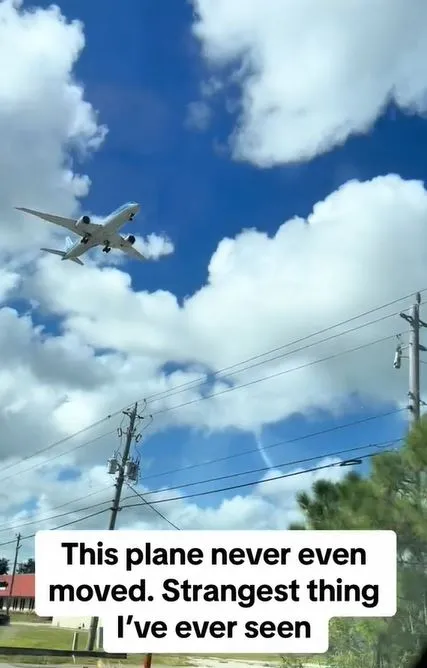 people stunned after spotting airplane appears stuck in the sky 3787