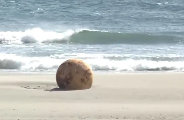 viewers stunned after spotting giant sphere on beach 3805