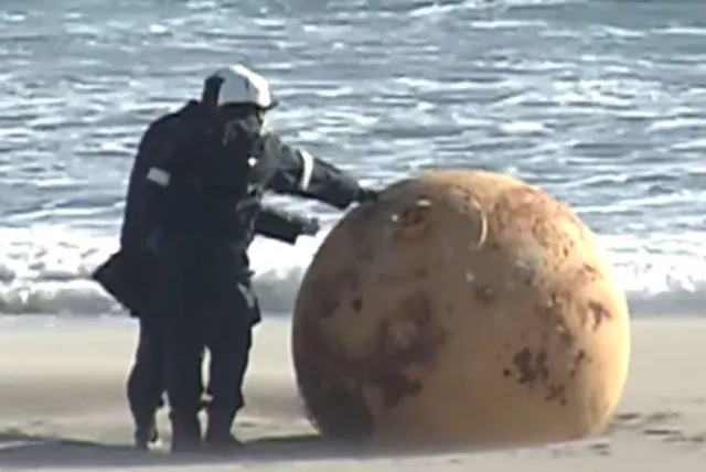 viewers stunned after spotting giant sphere on beach 3804
