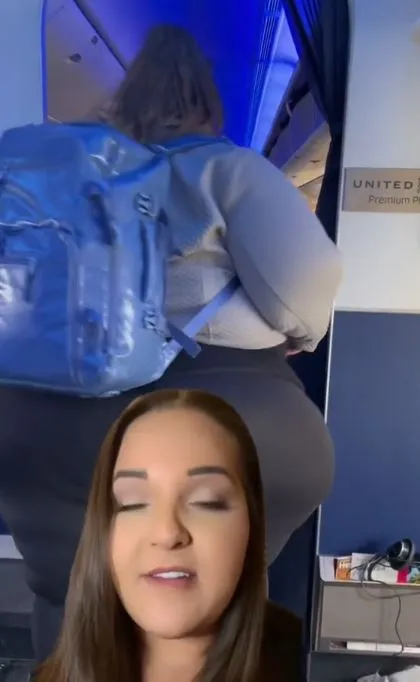 plus-sized passenger struggles with airplane bathroom due to narrow aisles 4204