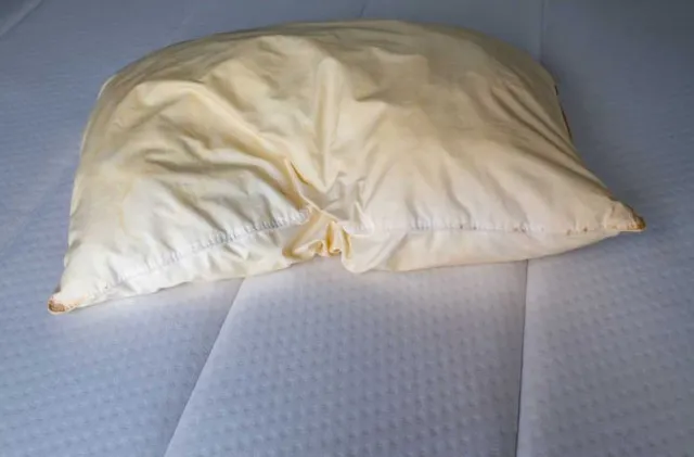 man sparks viral debate over the yellow pillow and explains why pillows t 7128