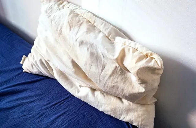 man sparks viral debate over the yellow pillow and explains why pillows t 7129