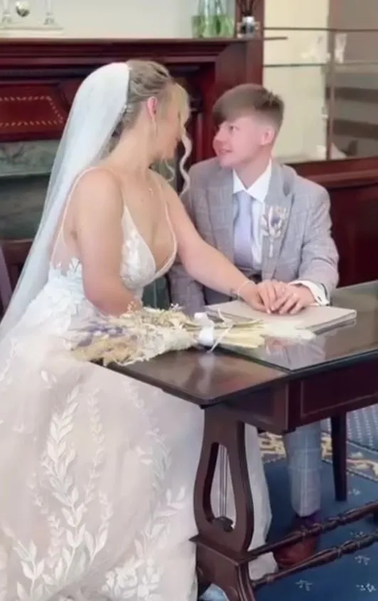 bride faces online trolls over wifes youthful appearance in their wedding 7353