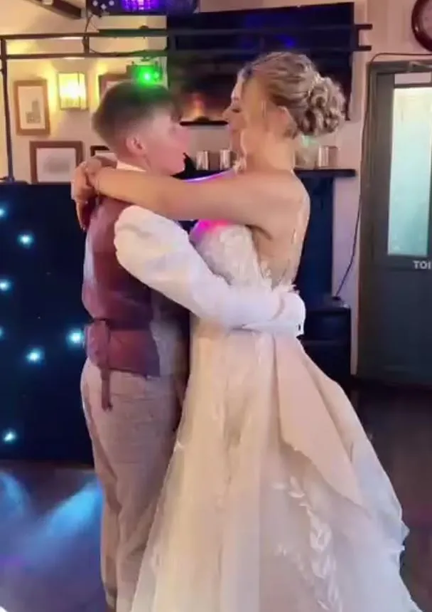 bride faces online trolls over wifes youthful appearance in their wedding 7352