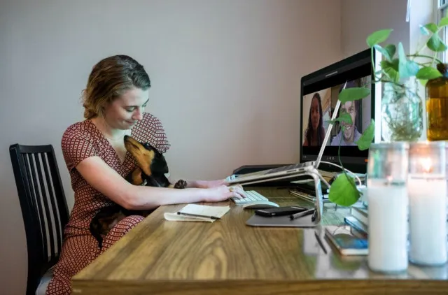 viral video of two women using laptops on a beach reignites the wfh debate 7456
