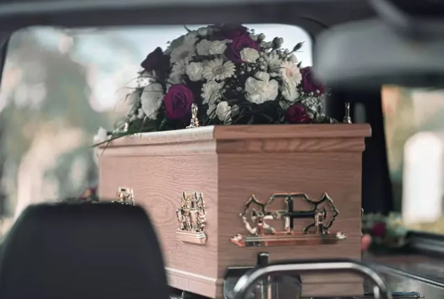 funeral home apologizes after body falls from hearse 7844