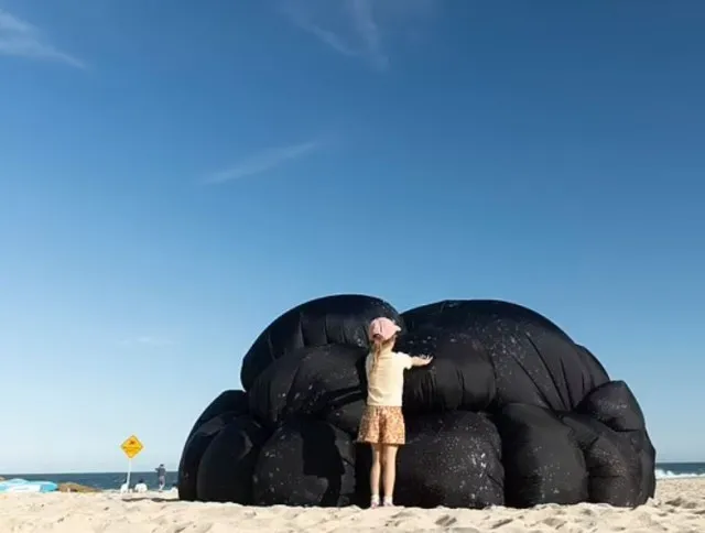 mysterious black balls found on sydney beaches sparked dark theories 7911