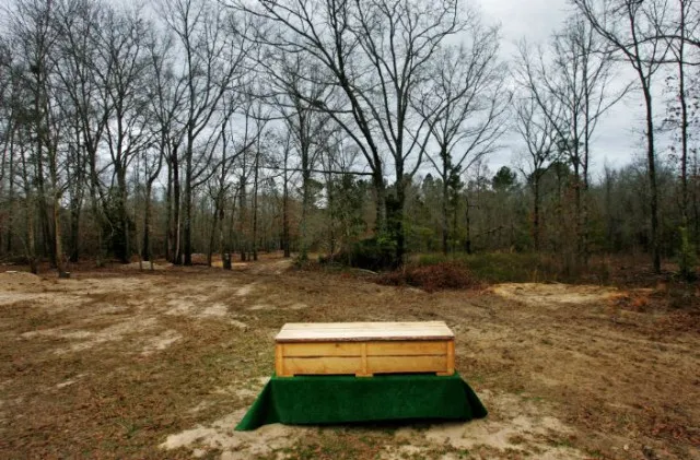 why do we bury people in conffins instead of just in the ground 7924