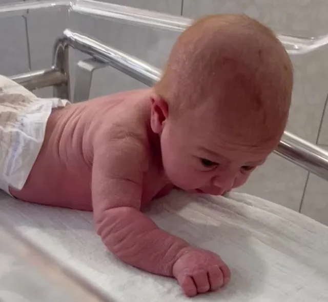 newborn stuns parents by attempting to crawl at just three days old 8885