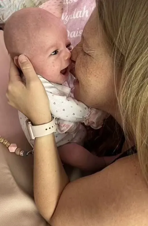 newborn stuns parents by attempting to crawl at just three days old 8884