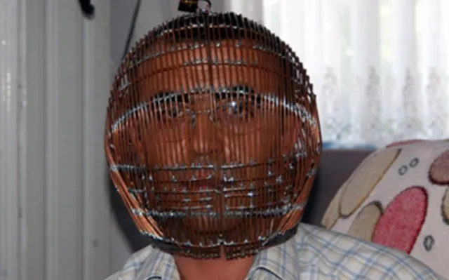 man locks his head in a massive cage and gives wife they key to quit smokin 9458