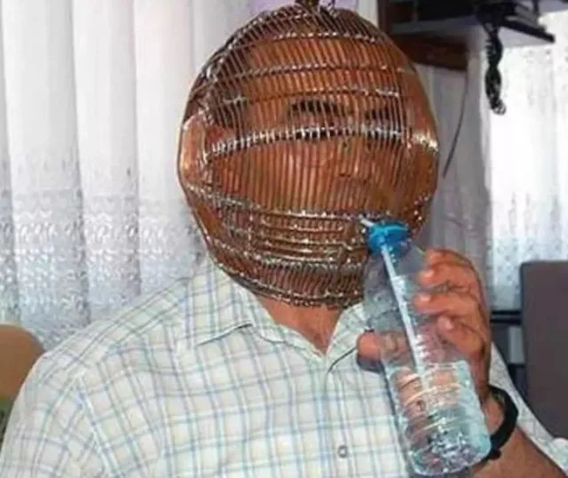 man locks his head in a massive cage and gives wife they key to quit smokin 9460