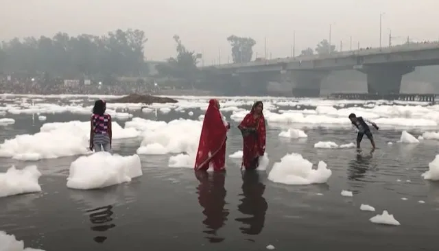 footage shows thousands bathe in toxic foam of ‘holy’ river 9787