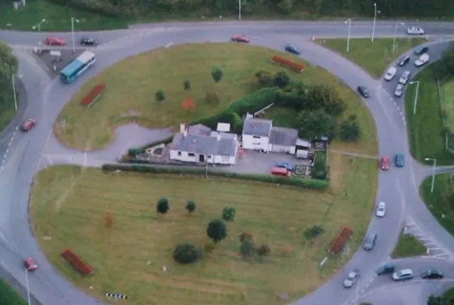 family refuses to leave their roundabout home 10288