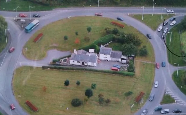 family refuses to leave their roundabout home 10284