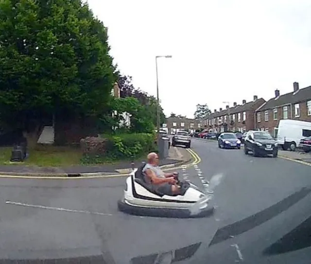 driver spotted on a public road behind the wheel of a fairground dodgem car 10633