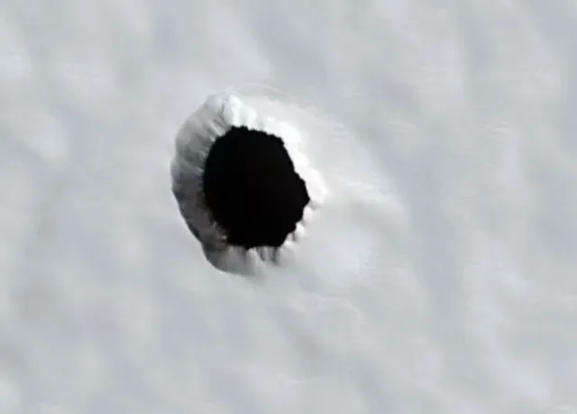 scientists have discovered mysterious hole on mars that could show ancient 10912