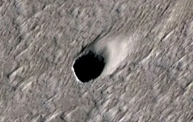 scientists have discovered mysterious hole on mars that could show ancient 10911