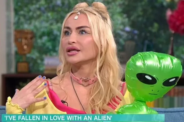 woman claims to be in love with alien partner and refuse to reveals his ind 10928