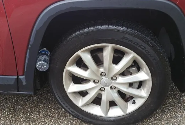 people should call 911 right away if a plastic bottle stuck under car tire 11195