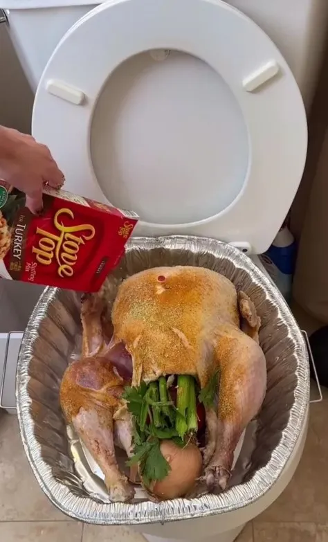 woman under fire after seasoning a raw turkey in toilet bowl for thanksgivi 11207