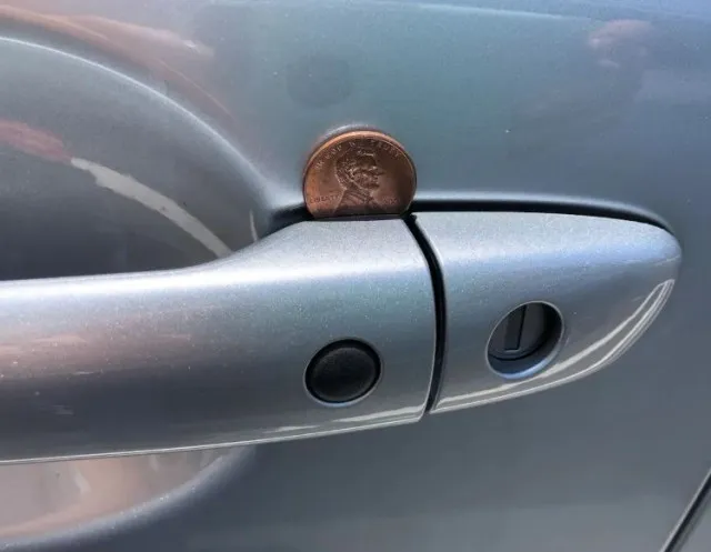 what does a coin in your car foor handle mean? 11538