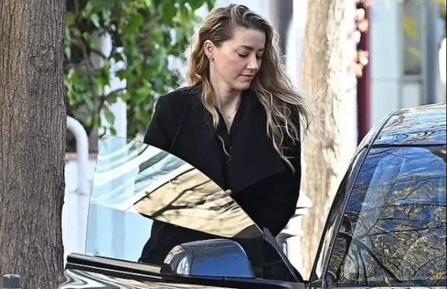 amber heard makes appearance in madrid with glowing look after announcing s 11703