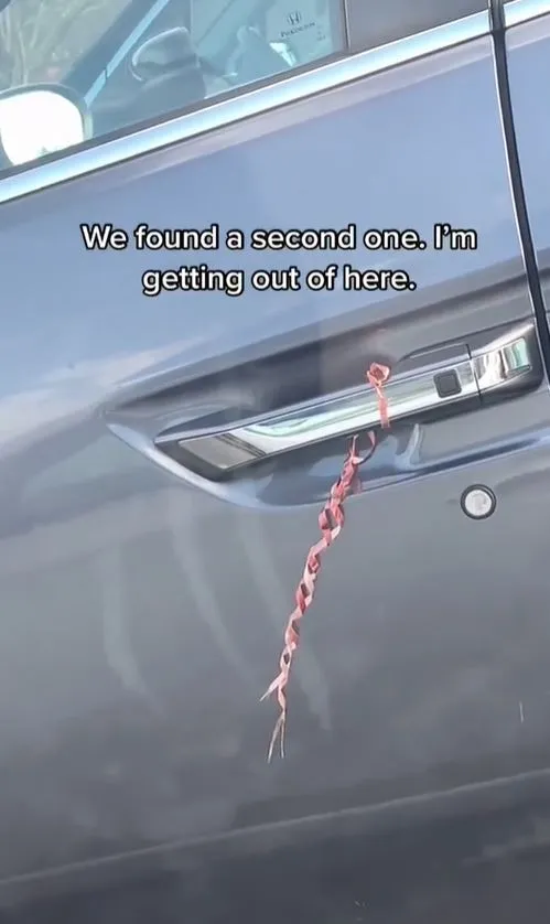 suspicious objects tied to car handles could signal danger 12003