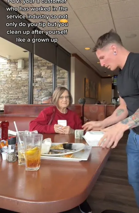 customer sparks debate after cleaning up for server at restaurant after eat 13096