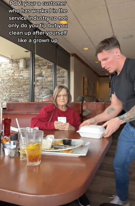 customer sparks debate after cleaning up for server at restaurant after eat 13097