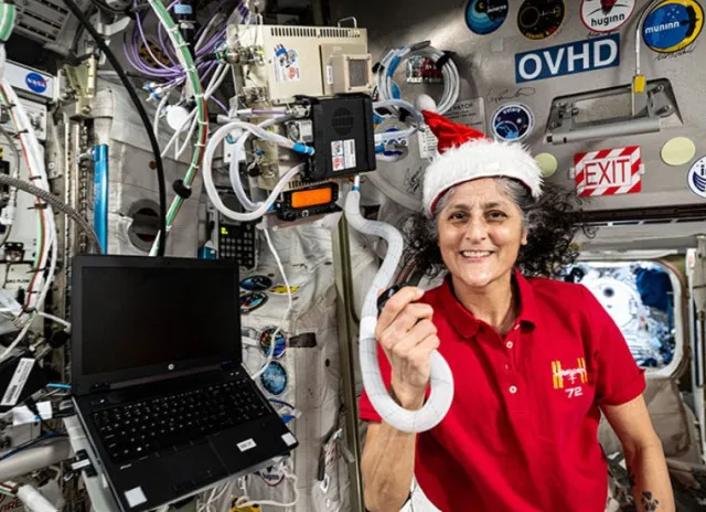 nasa stranded astronauts’ christmas photo in space raises debate about one 13331