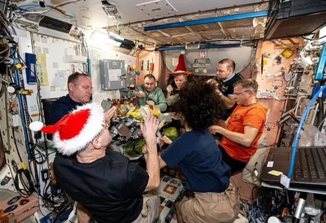 nasa stranded astronauts’ christmas photo in space raises debate about one 13329