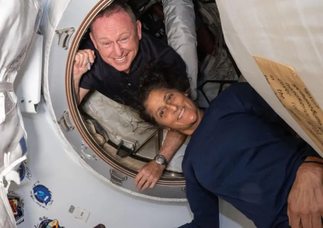 nasa stranded astronauts’ christmas photo in space raises debate about one 13332