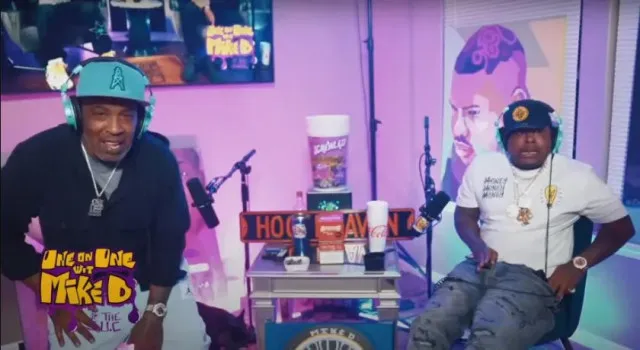 viewers stunned after rapper fires gun in pocket during live interview. 13918