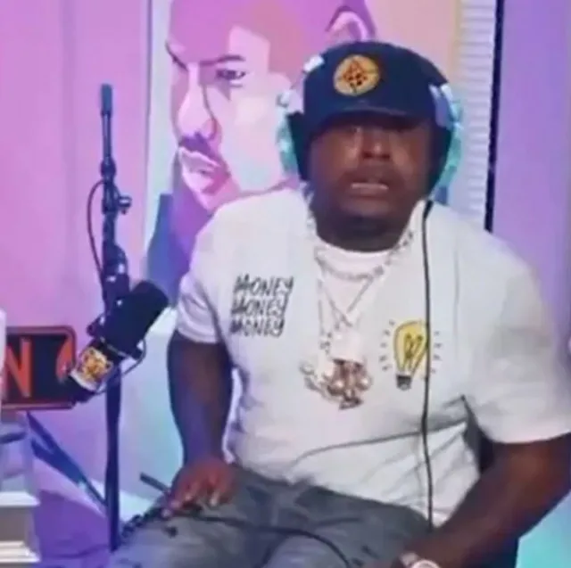 viewers stunned after rapper fires gun in pocket during live interview. 13916