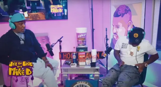 viewers stunned after rapper fires gun in pocket during live interview. 13917