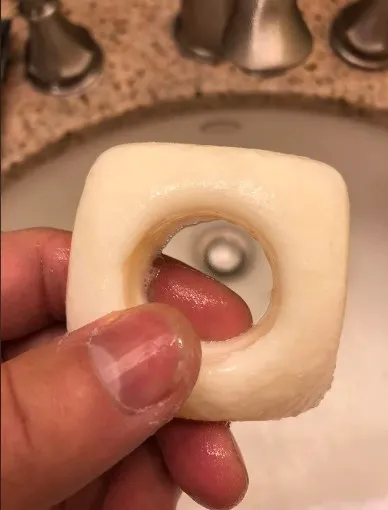 woman struggles to learn about unusual bar of soap in her boyfriends bathr 13944