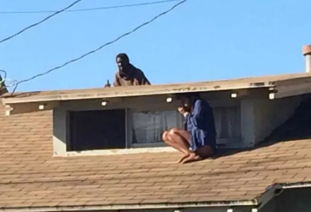 people spooked as photos show woman climbing roof to escape intruder only f 14072