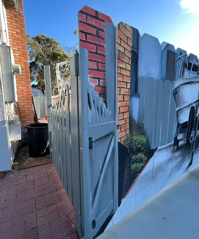 man ordered to build fence around his boat responds to the city by painting 14957