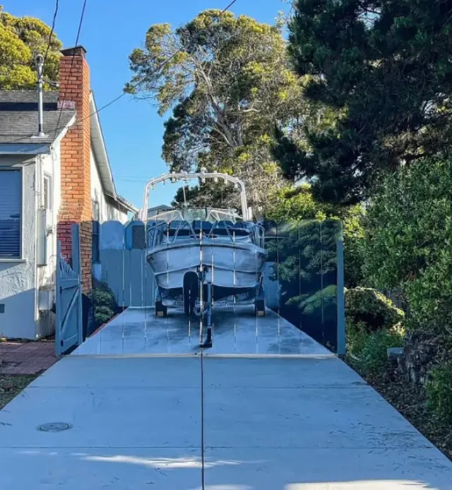 man ordered to build fence around his boat responds to the city by painting 14958