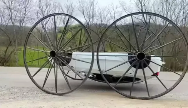 tesla owner causes a stir after adding giant 10-foot buggy wheels and drivi 14979