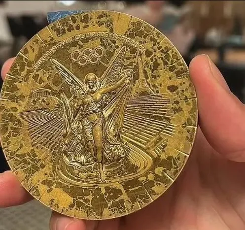 reality behind tarnished paris olympics medals revealed just days after d 15520