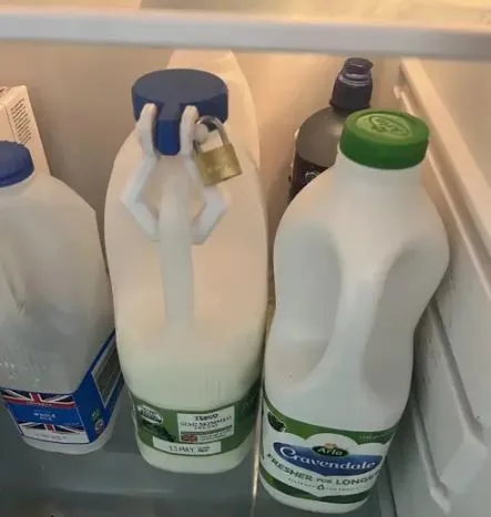 office worker padlocks their milk in the communal fridge and the internet i 16000