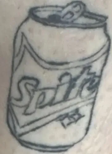 man baffled as tattoo turns into disaster when the artist misspells sprite 17149