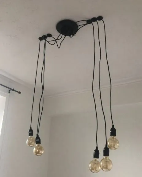man left baffled by electricians shambolic spider-style light fitting inst 17151