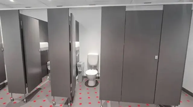 toilet stall rule sparks fierce online debate 17145