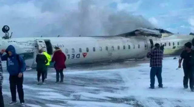 Footage shows Delta Airlines flight flipped upsidedown after crash