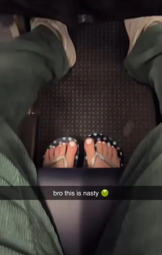 passenger gets instant karma for putting bare feet in another travelers pe 17510