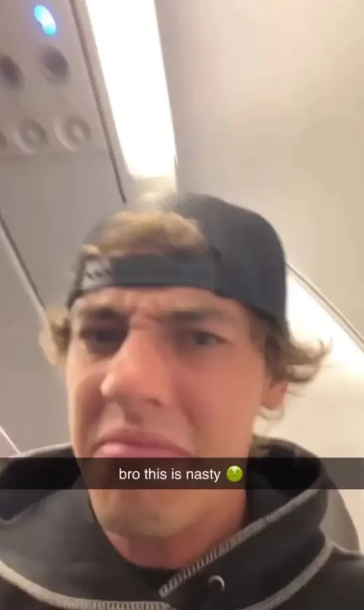 passenger gets instant karma for putting bare feet in another travelers pe 17509